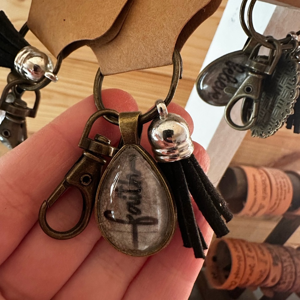 Bronze Keychain with Black Tassel and Silver Accents